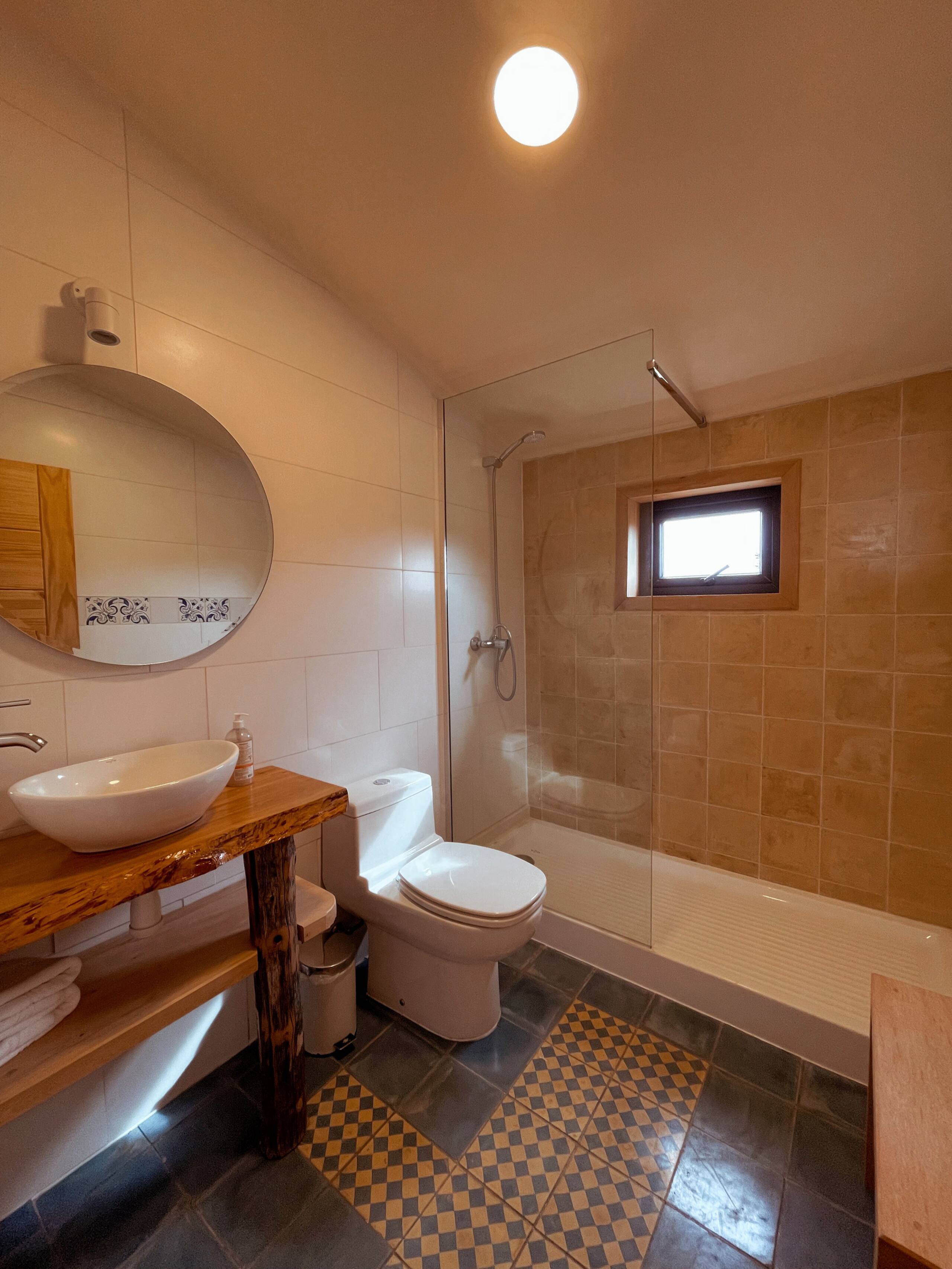 >One of the two bathrooms